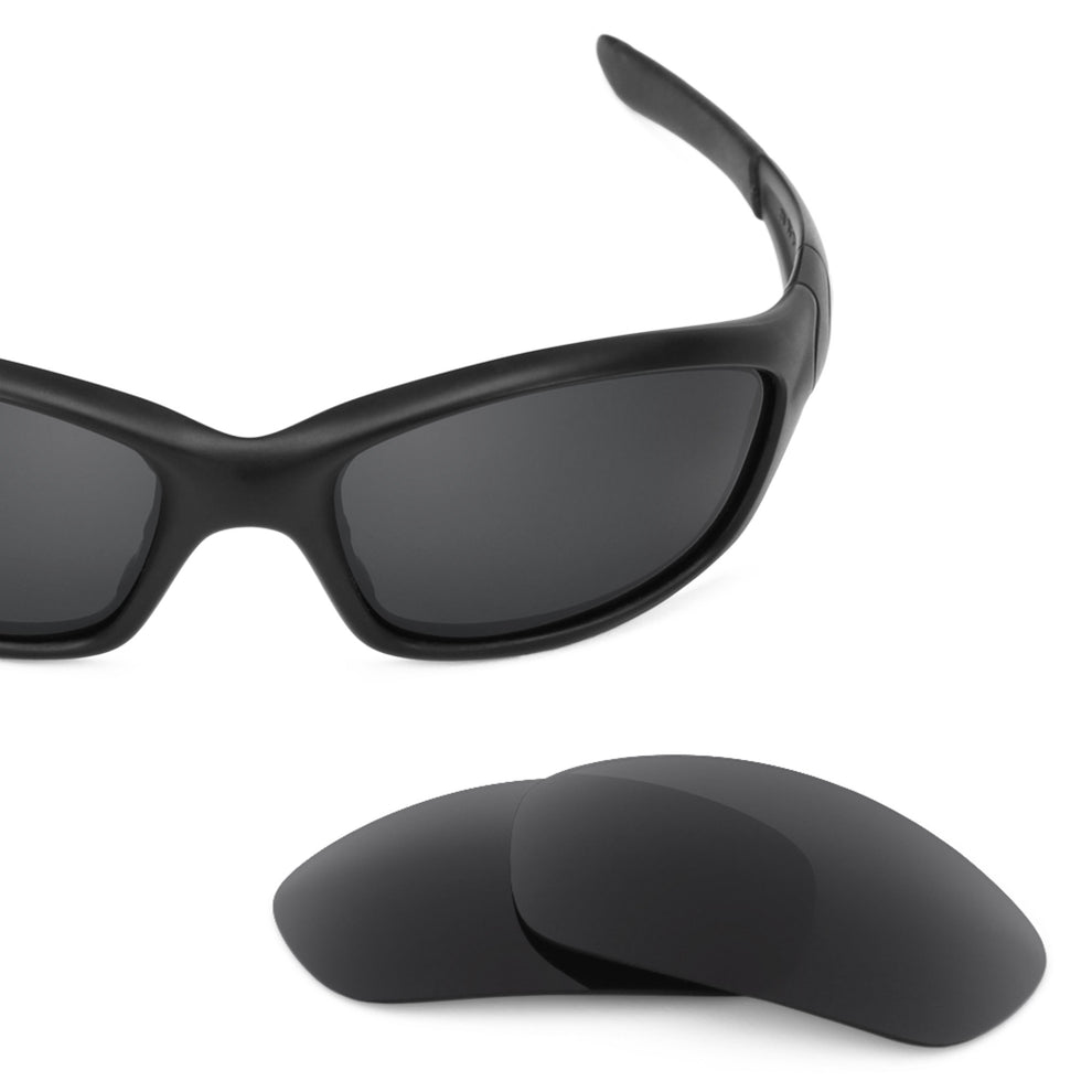 Oakley Straight Jacket (2007) frame with Revant replacement Polarized Stealth Black lenses